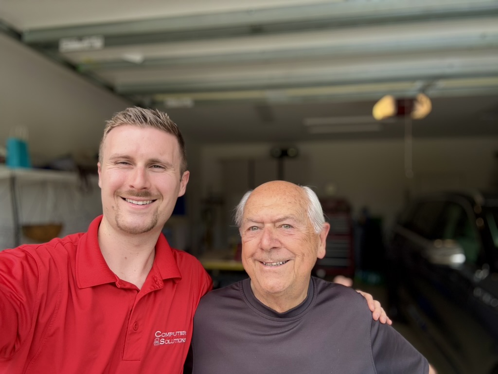 Preston with Carl, who works in a furniture-making construction business